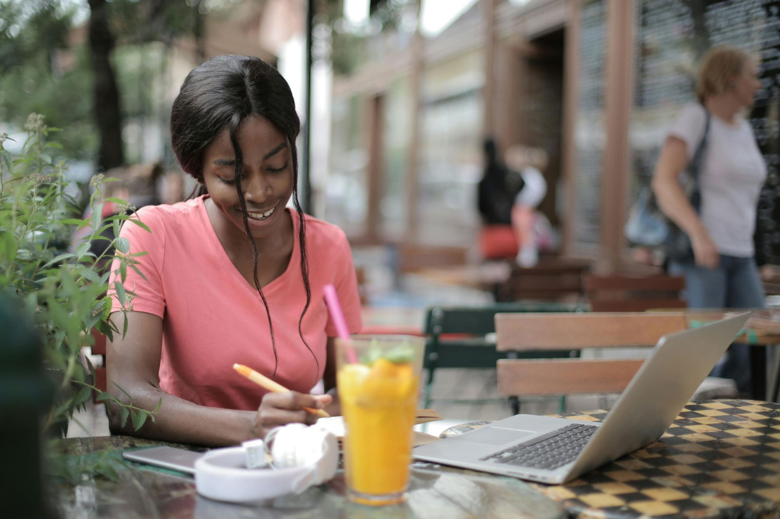 Woman sitting in a cafe with a blurred background