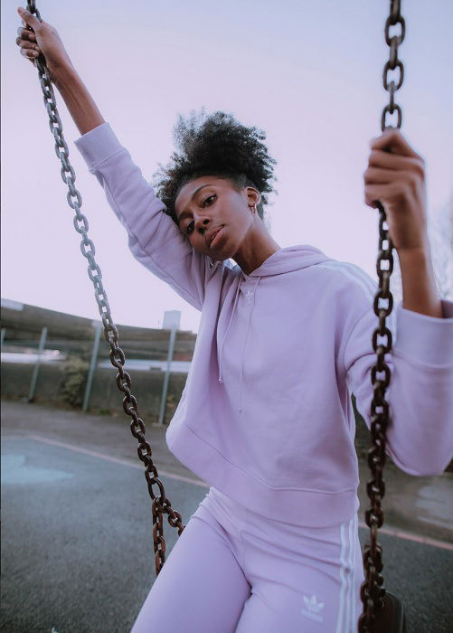 Woman in Adidas Tracksuit on a swing