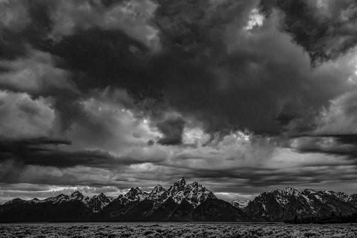 Mountain landscape with moody sky overhead