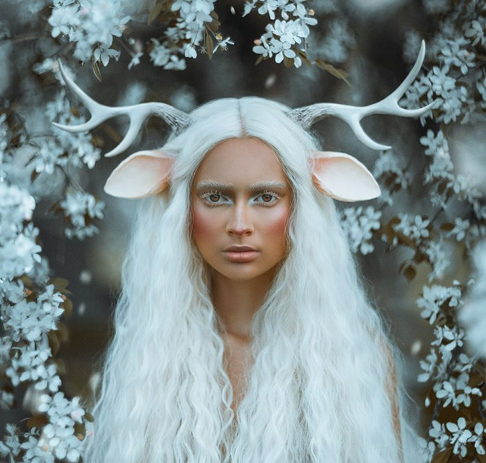 Deer woman with long white hair