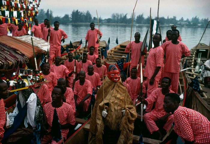 Boats full of people wearing red