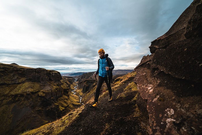 Hiker hiking mountain trail