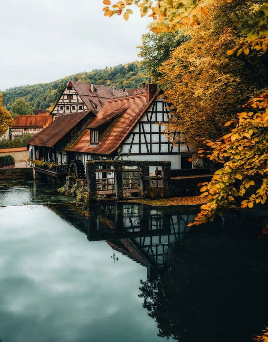 Traditional old house on the banks of a river