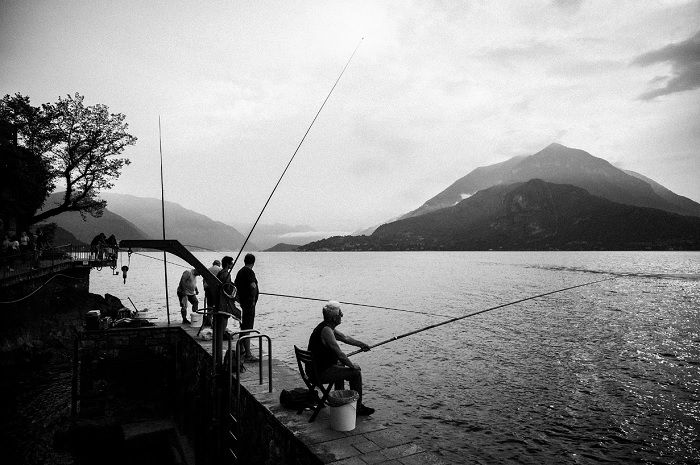 Fishermen on the banks of Lake Como