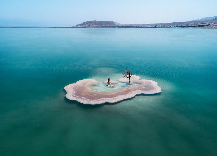 Small island in blue sea