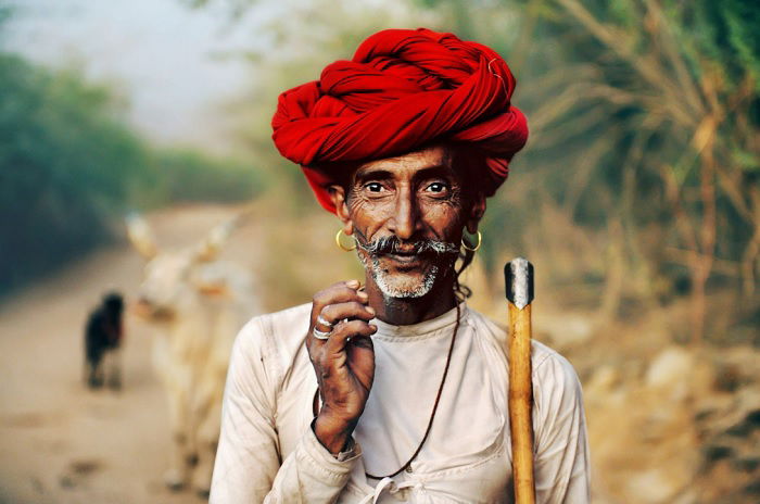 Portrait of man in red turban