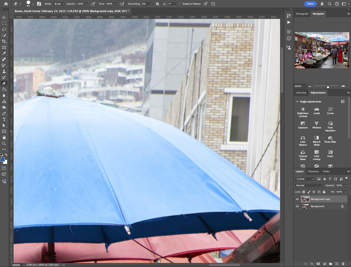 zoom in of blue umbrella in photoshop