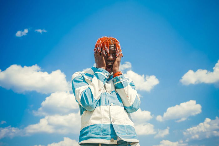 Lil Yachty against a blue sky