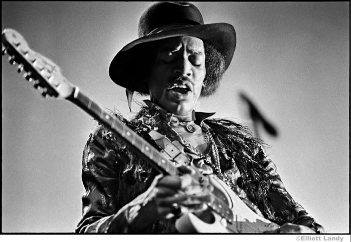 Jimi Hendrix playing guitar