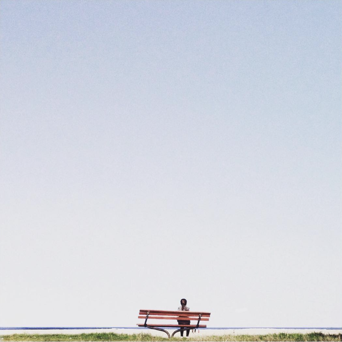 woman sitting on bench 