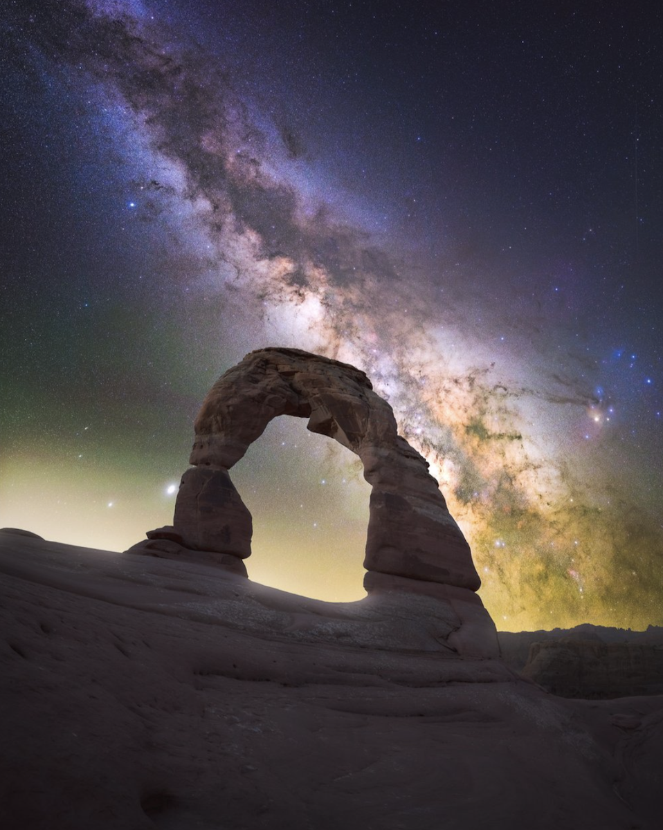 natural arch with milky way stars behind