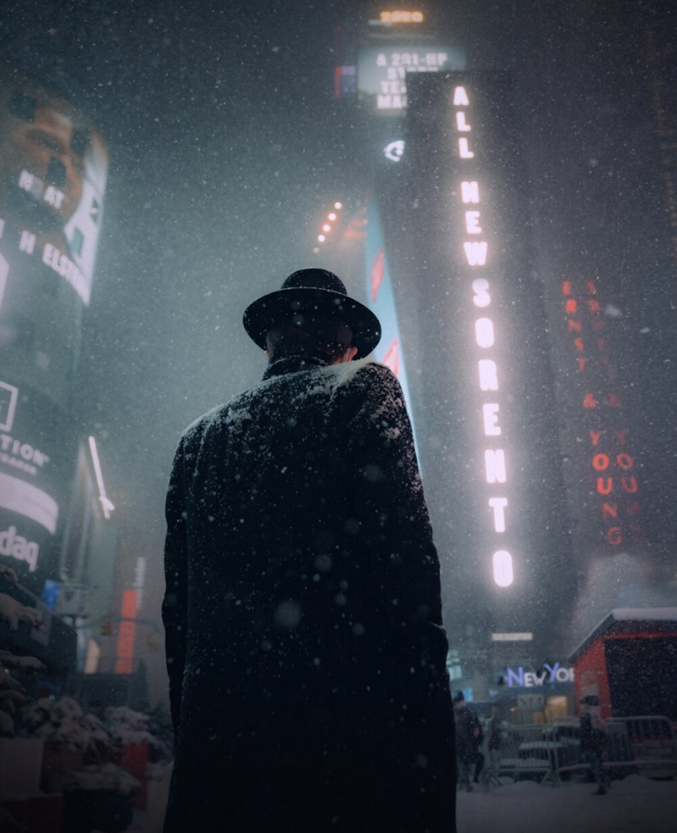 photography of man in snow in city centre 