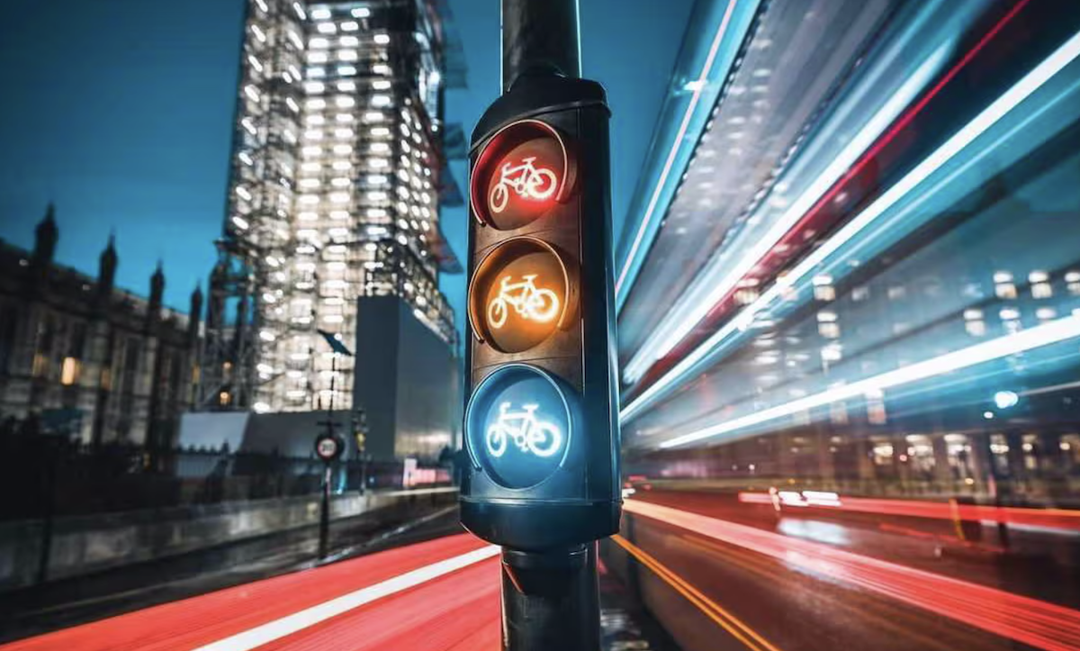 photo of bike traffic lights at night